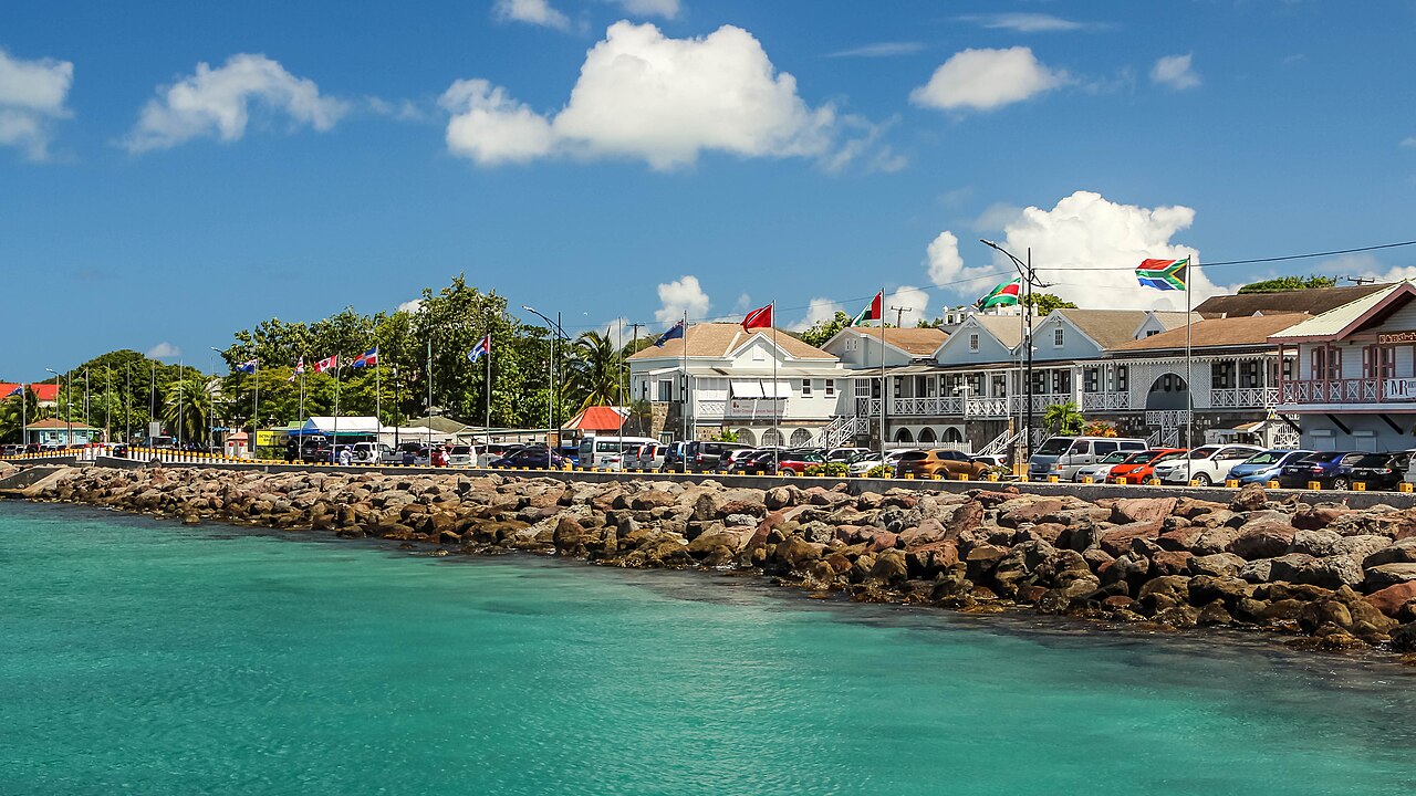 Charlestown's waterfront buildings and seawall, viewed from the water in Nevis